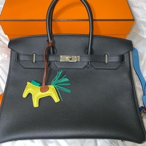 HERMÈS Milo GriGri Rodeo Bag Charm pm